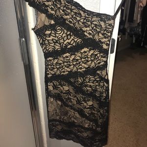 BEBE laced one shoulder black and beige.  Size xs